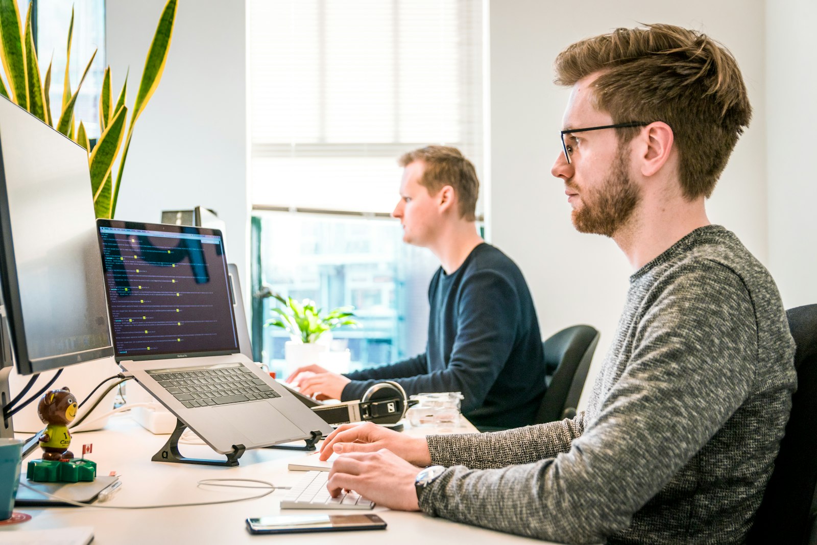 Shark Matrix developers working on Express.js backend code